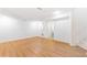 Finished basement featuring laminate flooring and white walls at 3902 Concord Walk Se Dr, Smyrna, GA 30082