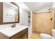 Bathroom featuring shower with tile surround and modern vanity at 3902 Concord Walk Se Dr, Smyrna, GA 30082