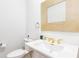 Stylish half bathroom with designer mirror and fixtures at 3902 Concord Walk Se Dr, Smyrna, GA 30082