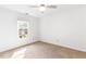 Bright bedroom with neutral carpet and a window at 3902 Concord Walk Se Dr, Smyrna, GA 30082