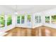 Sun-filled breakfast nook features hardwood floors and views of the backyard at 3902 Concord Walk Se Dr, Smyrna, GA 30082