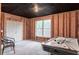 Unfinished basement features an air hockey table, an exposed ceiling, and a double door at 12640 Hearthstone Way, Alpharetta, GA 30009