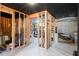 Unfinished basement with exposed framing offers ample storage or customization potential at 12640 Hearthstone Way, Alpharetta, GA 30009