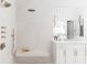 Beautiful bathroom with a stone shower, bench, and large vanity featuring modern fixtures and finishes at 12640 Hearthstone Way, Alpharetta, GA 30009