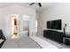 Bright main bedroom with walk-in closet, ensuite bath, and dark wood dresser at 12640 Hearthstone Way, Alpharetta, GA 30009