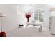 Bright home office with a large window, modern desk, and stylish décor for a productive workspace at 12640 Hearthstone Way, Alpharetta, GA 30009