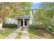 Beautiful townhome with a manicured lawn and a welcoming entryway at 241 Odyssey Turn Nw, Conyers, GA 30012