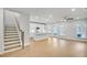 Bright, open floor plan features hardwood floors, recessed lighting and seamlessly connects to kitchen at 5761 Tillman Way, Powder Springs, GA 30127
