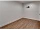 Bedroom with hardwood floors and wall mount for a TV at 7160 Round Rd, Cumming, GA 30040