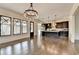 Spacious eat-in kitchen with stainless steel appliances, dark wood cabinets and large kitchen island at 7160 Round Rd, Cumming, GA 30040