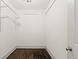 Walk-in closet features hardwood floors, white walls, and wire shelving at 1200 Virginia Ct # 101, Atlanta, GA 30306