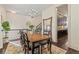 Elegant dining room featuring stylish chairs, hardwood floors, and a chandelier, ideal for Gathering dinners at 1200 Virginia Ct # 101, Atlanta, GA 30306