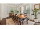 Elegant dining room with natural light, a chandelier, and hardwood floors perfect for entertaining at 1200 Virginia Ct # 101, Atlanta, GA 30306