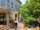 Inviting brick townhome with a charming front entrance and a well-manicured landscape at 1200 Virginia Ct # 101, Atlanta, GA 30306