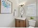 Charming bathroom featuring modern fixtures, vanity, and ample lighting that offers a clean and refreshing space at 1228 Dunwoody Walk, Atlanta, GA 30338