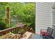 Charming patio area with comfortable seating and peaceful outdoor scenery at 1228 Dunwoody Walk, Atlanta, GA 30338