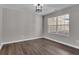 Bedroom featuring a vaulted ceiling and a large window at 217 Lamb Rd, Moreland, GA 30259
