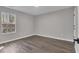Bedroom with natural light from window and gray walls at 217 Lamb Rd, Moreland, GA 30259