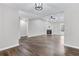 Bright living room features hard flooring, a fireplace, and ceiling fan at 217 Lamb Rd, Moreland, GA 30259
