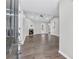 Open-concept living room featuring a fireplace and vaulted ceilings at 217 Lamb Rd, Moreland, GA 30259