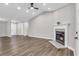 Living room features hard flooring and a fireplace, creating a warm atmosphere at 217 Lamb Rd, Moreland, GA 30259