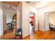 Hallway featuring hardwood floors, white walls, and an open door at 2383 N Decatur Rd, Decatur, GA 30033