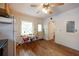 Bright kitchen featuring hardwood floors, wooden cabinets, and a cozy window-side table at 2383 N Decatur Rd, Decatur, GA 30033
