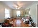 Bright living room featuring hardwood floors, ceiling fan, and natural light at 2383 N Decatur Rd, Decatur, GA 30033