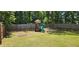 This home has a well maintained backyard with a playground at 3830 Kittery Pt, Snellville, GA 30039