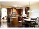 Well-equipped kitchen with an island, stainless steel appliances, and adjacent dining area at 3830 Kittery Pt, Snellville, GA 30039