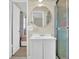 Bathroom with a white vanity, walk-in shower and neutral paint at 699 Rollingwood Dr, Stone Mountain, GA 30087