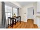 Bright breakfast nook features natural light and a stylish dark wood table and chair set at 699 Rollingwood Dr, Stone Mountain, GA 30087