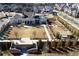 Aerial view of a community clubhouse, pool, and common area, showcasing the community amenities at 10265 Grandview Sq, Johns Creek, GA 30097