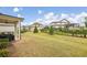 Expansive backyard with lush green grass and tasteful landscaping, perfect for outdoor enjoyment at 10265 Grandview Sq, Johns Creek, GA 30097