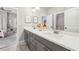 Primary bath with dual sinks, modern fixtures, and a large, well-lit vanity at 10265 Grandview Sq, Johns Creek, GA 30097