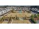Aerial view of the community highlighting the pool, amenity center, and common areas at 10265 Grandview Sq, Johns Creek, GA 30097