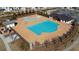 Community pool showcasing a large recreational pool with an attached splash pad and a playground at 10265 Grandview Sq, Johns Creek, GA 30097