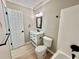 Neutral-toned bathroom featuring a vanity with a framed mirror and full tub and shower at 134 Carrollwood Dr, Fayetteville, GA 30215