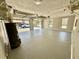 Spacious three-car garage with ample room for vehicles and storage at 134 Carrollwood Dr, Fayetteville, GA 30215