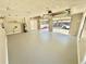 Clean three-car garage interior, perfect for storage, workshop or parking at 134 Carrollwood Dr, Fayetteville, GA 30215