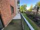 Private balcony offering an outdoor space with views of lush greenery at 300 Johnson Ferry Rd # B105, Atlanta, GA 30328