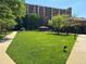 Well-maintained lawn featuring mature trees, manicured landscaping, and a gazebo at 300 Johnson Ferry Rd # B105, Atlanta, GA 30328