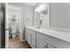 Bathroom featuring a white quartz countertop, modern fixtures, and a shower/tub combination at 4716 Alpine Sw Dr, Lilburn, GA 30047