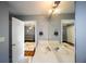 Shared bathroom features double sinks and a view to a bedroom with space-themed decor at 794 Lucas Dr, Hampton, GA 30228