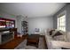 Cozy living room featuring a fireplace, hardwood floors, and plenty of room for relaxing at 794 Lucas Dr, Hampton, GA 30228
