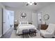 Cozy bedroom with decorative pillows, stylish furniture, and serene gray color scheme at 842 Brighton Dr, Lawrenceville, GA 30043