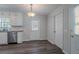 Modern dining space featuring stylish floors, an outdoor-access door and lots of light at 842 Brighton Dr, Lawrenceville, GA 30043