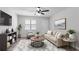 Bright living room features modern decor, neutral tones, and stylish furnishings at 842 Brighton Dr, Lawrenceville, GA 30043