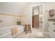 Bathroom with soaking tub and decorative tile at 937 E Rock Springs Ne Rd, Atlanta, GA 30306