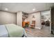 Bedroom with a desk and view into the living room at 937 E Rock Springs Ne Rd, Atlanta, GA 30306